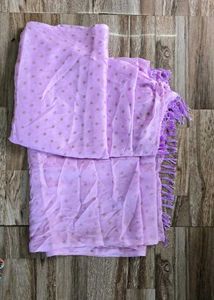 Lavender saree with stiched blouse