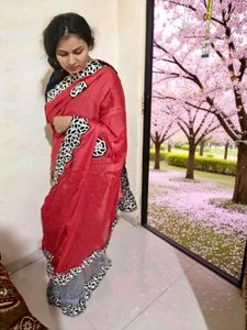 Vibrant Red Saree with Elegant Border