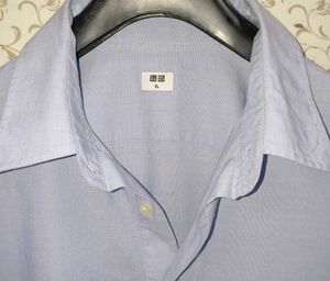 uniqlo light blue half button shirt