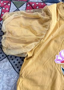 Mustard Yellow T-Shirt with Floral Vase