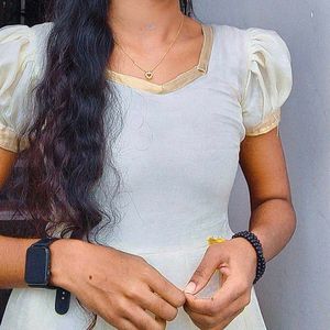 Elegant Cream Kurta with Golden Border