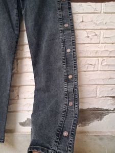 branded buttoned jeans