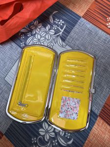 2 Clutches And 1 Handbag