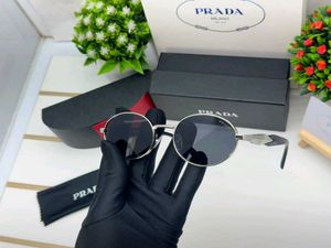 Prada Sunglasses - Round Metal Frame