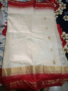 White saree with red border