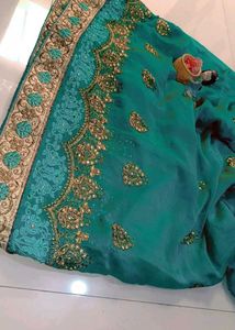 Exquisite Teal Embroidered Saree