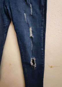 Ripped Blue Denim Jeans