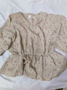Chic Beige Heart Print Peplum Top