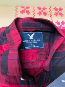 red check shirt with tag