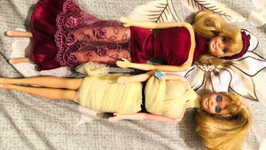 two leo Vintage Barbie Dolls