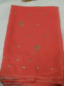 Elegant Orange Saree with Golden Embellishments