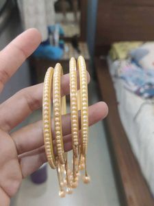 Elegant Pearl & Gold Bangles