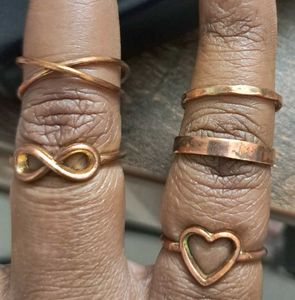 Set of 5 Assorted copper toned Rings