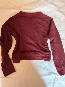 maroon sweater
