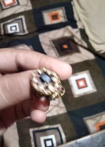 Elegant Gold Ring with Ruby Accents