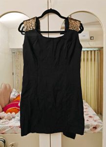 Chic Black Dress with Sequined Shoulders