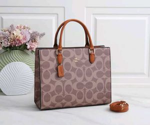 COACH**12A QUALITY HANDBAG* AT OFFER PRICE
