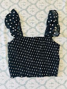 black polka dot top