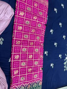 Vibrant Pink Saree with Gold Motifs