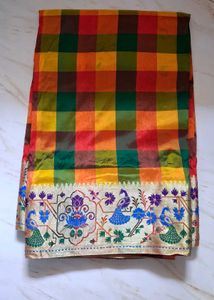 Vibrant Checked Silk Saree with Peacock Border