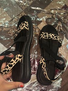 Stylish Black Sandals with Animal Print Accent