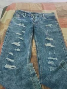 Distressed Blue Denim Jeans