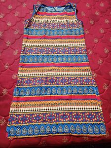 INDIDORI Brand, Multi Coloured Kurti With Beautiful 'chumki' Design On The Neck And Bottom Part.