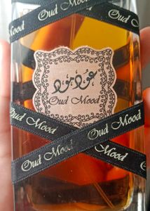 lattafa Oud Mood Perfume Bottle