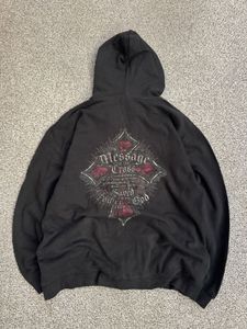 Black Zip-Up Hoodie with Cross Graphic
