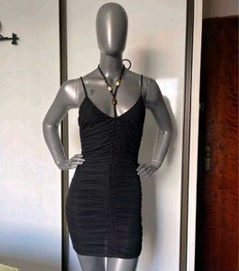 Sleek Black Ruched Mini Dress