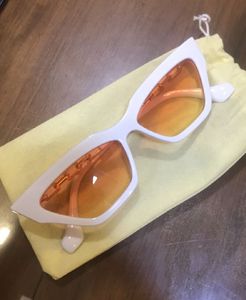 White Cat-Eye Sunglasses with Orange Lenses