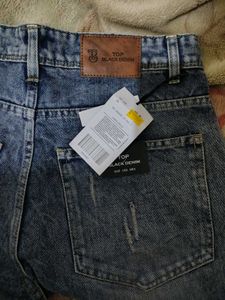 Washed Blue Ripped Jeans