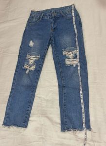 Distressed Blue Denim Jeans