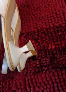 17. Elegant White Slingback Heels