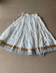 Fix price cream and golden skirt