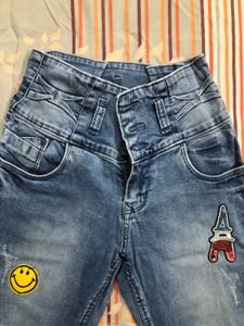 Blue Ribbed Jeans With Patchwork