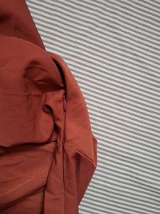 Elegant Rust Colored Draped Dress