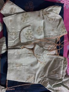 Elegant Teal Saree with Embellished Blouse