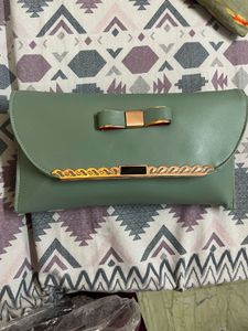 Elegant Green Clutch with Bow Detail