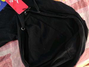 Black hoodie with "LUCKEY" graphic