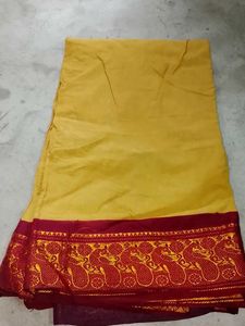 Beautiful Yellow Saree with Red Border
