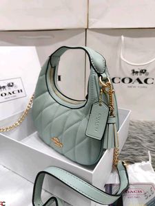 COACH* *CARMEN MINI CROSSBODY BAG IN QUILTED LEATH