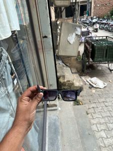 Stylish Black Sunglasses with Gold Accent