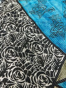 Vibrant saree with Floral Accents