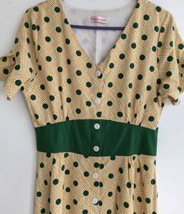 Green polka dot yellow dress