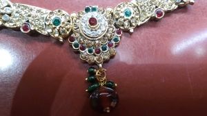 Elegant Gold-Toned Necklace Set with Stones