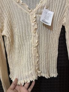 Cream Ruffle Knit Cardigan