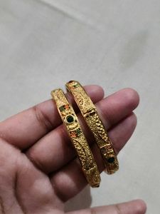 Elegant Gold Tone Bangles with Stones