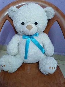 Adorable White Teddy Bear with Blue Bow