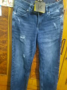 Distressed Slim Fit Jeans